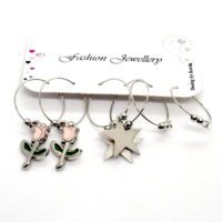 Toptan Gümüş Renk Pembe Mineli Çiçek Yıldız Figurlu Kombin Küpe 711