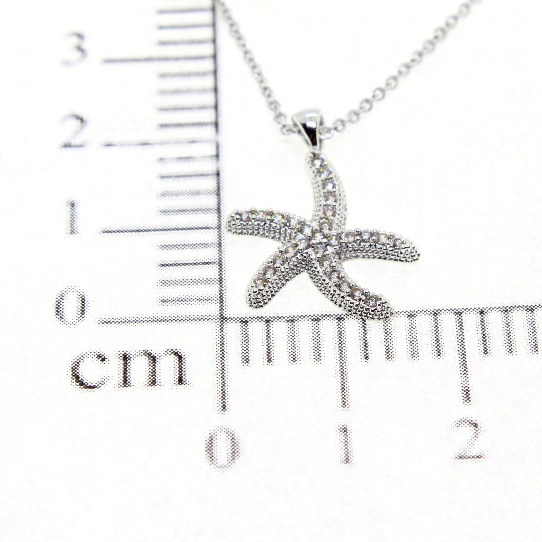 Toptan Gümüş Renk Zirkon Taşlı Kolye Deniz Yıldızı Kolye - 1771 4 Toptan Gümüş Renk Zirkon Taşlı Kolye Deniz Yıldızı Kolye - 1771 - Görsel 2