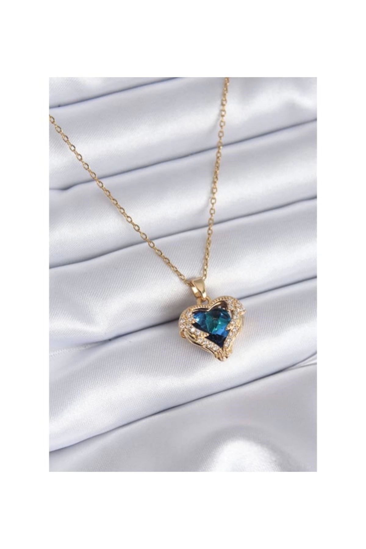 Toptan Altın Renk Sf Zincirde Mavi Kalp Gezegen Vip Solmaz Kararmaz Çelik Kolye - 3045 3 Toptan Altın Renk Sf Zincirde Mavi Kalp Gezegen Vip Solmaz Kararmaz Çelik Kolye - 3045