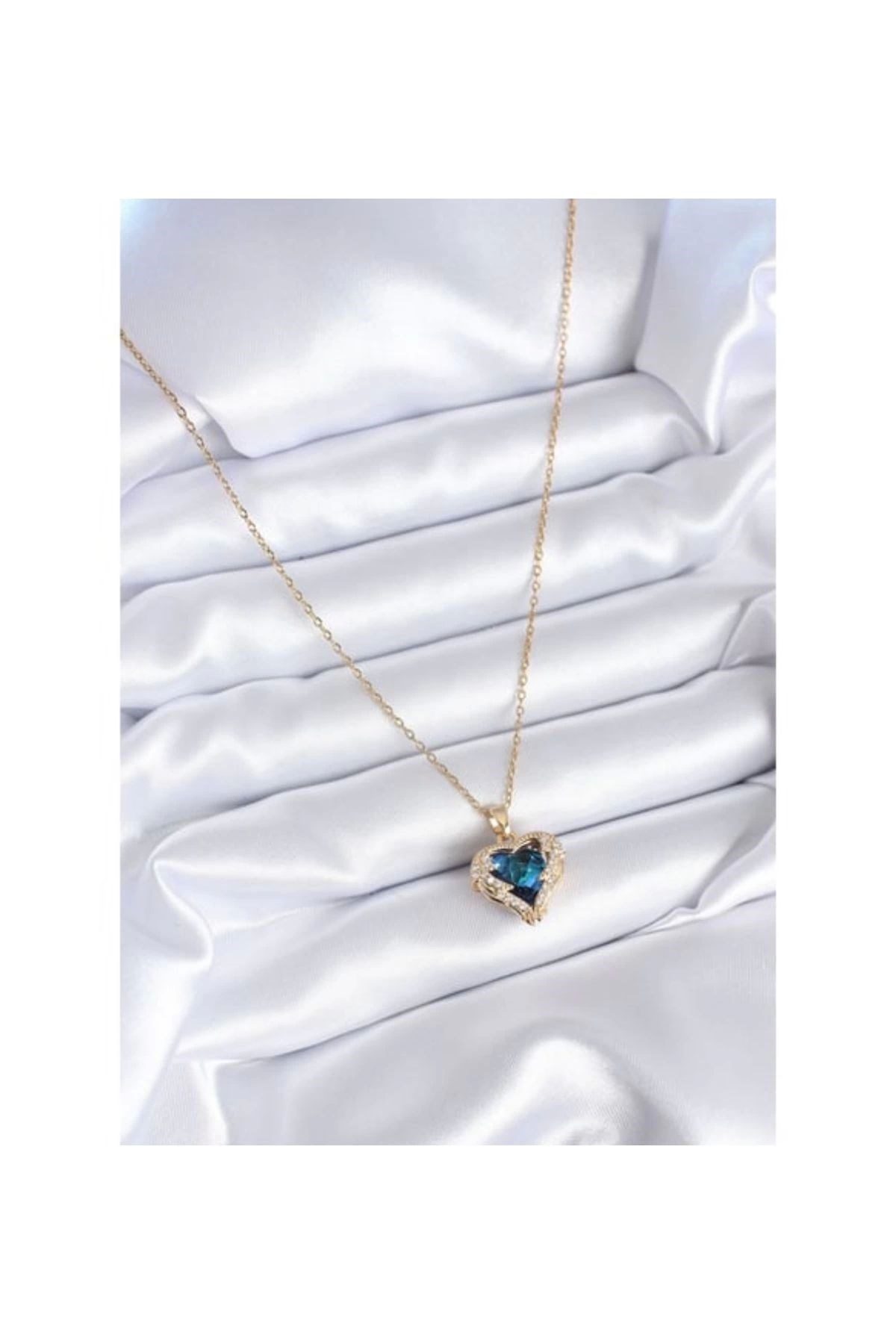 Toptan Altın Renk Sf Zincirde Mavi Kalp Gezegen Vip Solmaz Kararmaz Çelik Kolye - 3045 5 Toptan Altın Renk Sf Zincirde Mavi Kalp Gezegen Vip Solmaz Kararmaz Çelik Kolye - 3045 - Görsel 3