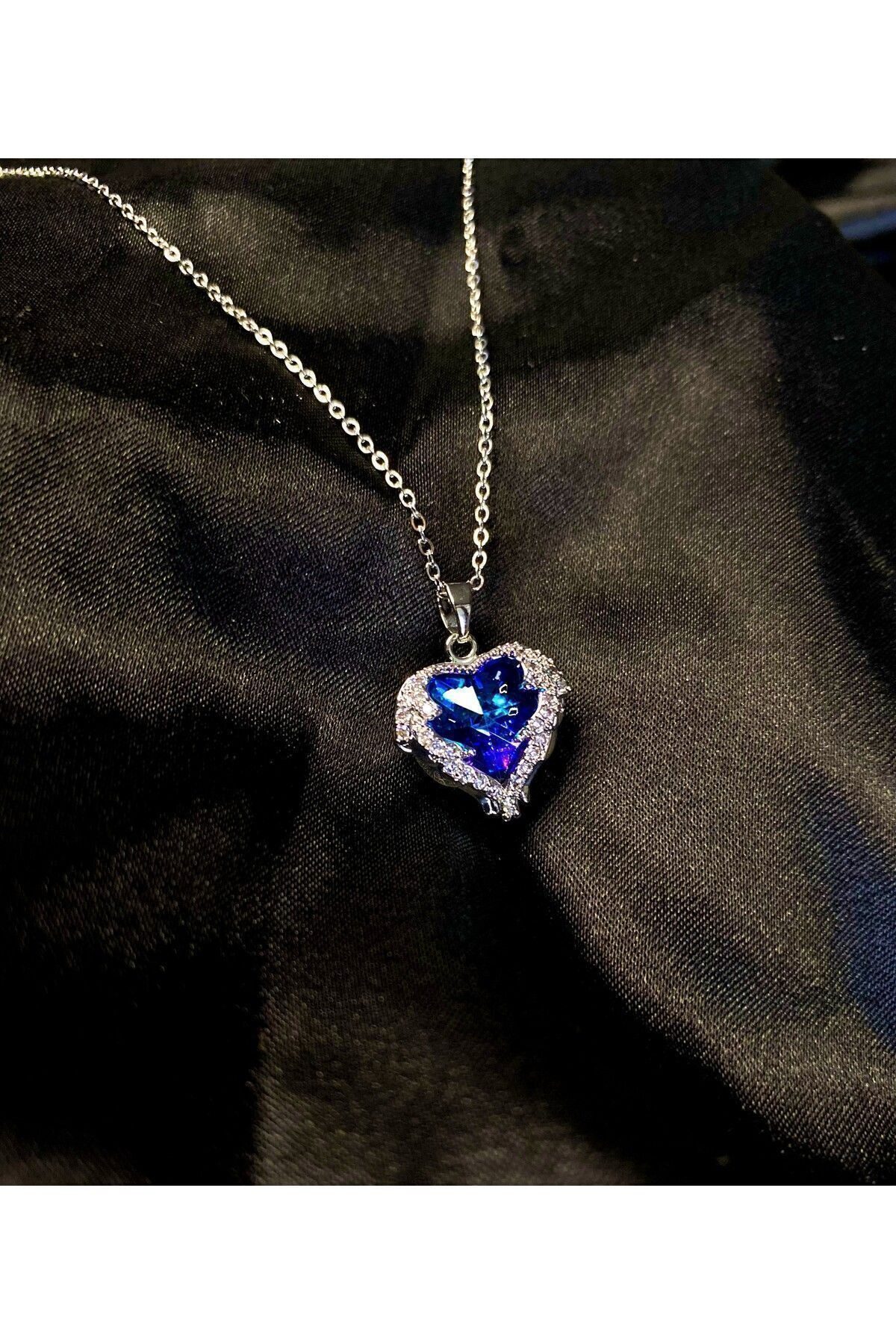 Toptan Gümüş Renk Sf Zincirde Mavi Kalp Gezegen Vip Solmaz Kararmaz Çelik Kolye - 3201 4 Toptan Gümüş Renk Sf Zincirde Mavi Kalp Gezegen Vip Solmaz Kararmaz Çelik Kolye - 3201 - Görsel 2