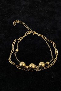 703e7bcc06604eada0c86425eaf3f945-toptan taki