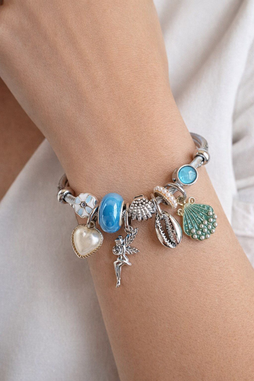 Toptan Gümüş Renk Mavi Deniz Kabuğu Charmlı Pandora Çelik Bileklik - 3184 3 Toptan Gümüş Renk Mavi Deniz Kabuğu Charmlı Pandora Çelik Bileklik - 3184