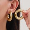 Toptan Altın Renk Kontur Hatlı Bombeli C Halka 22k Gold Çelik Küpe.- 3949 1 788ddccff8f74e1d89d307aa59a6ab1d-toptan taki